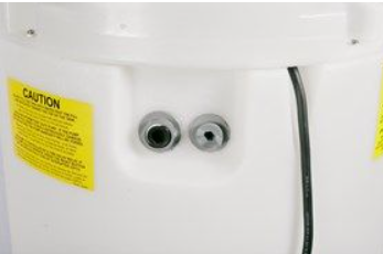 Close up of the inlet and outlet ports on the Water Works fresh water tank