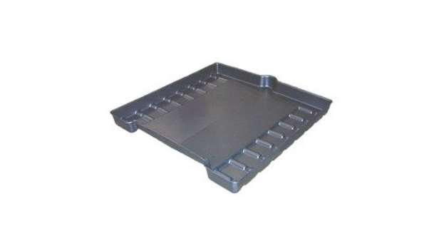 The containment tray seen from above, showing the flat center, ribbed side channels and rear drain notch